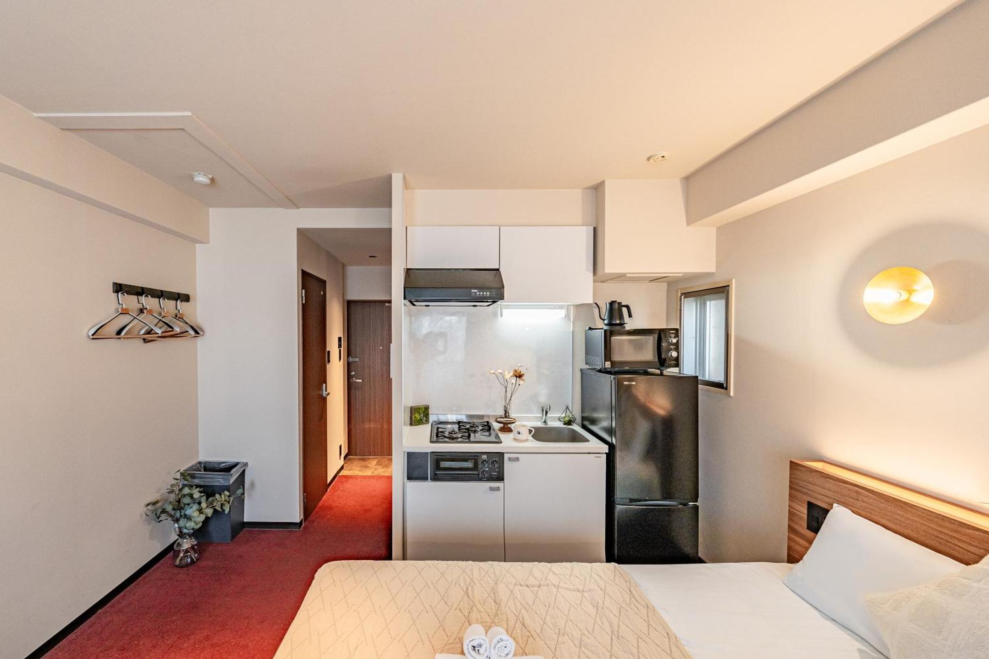 Apartment Hotel 11 Shinsaibashi Amemura Osaka Buitenkant foto